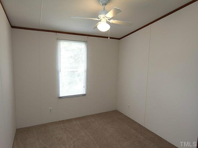 4501 Durham Road Raleigh, NC 27614 - Photo 10 of 12 an empty room with a window