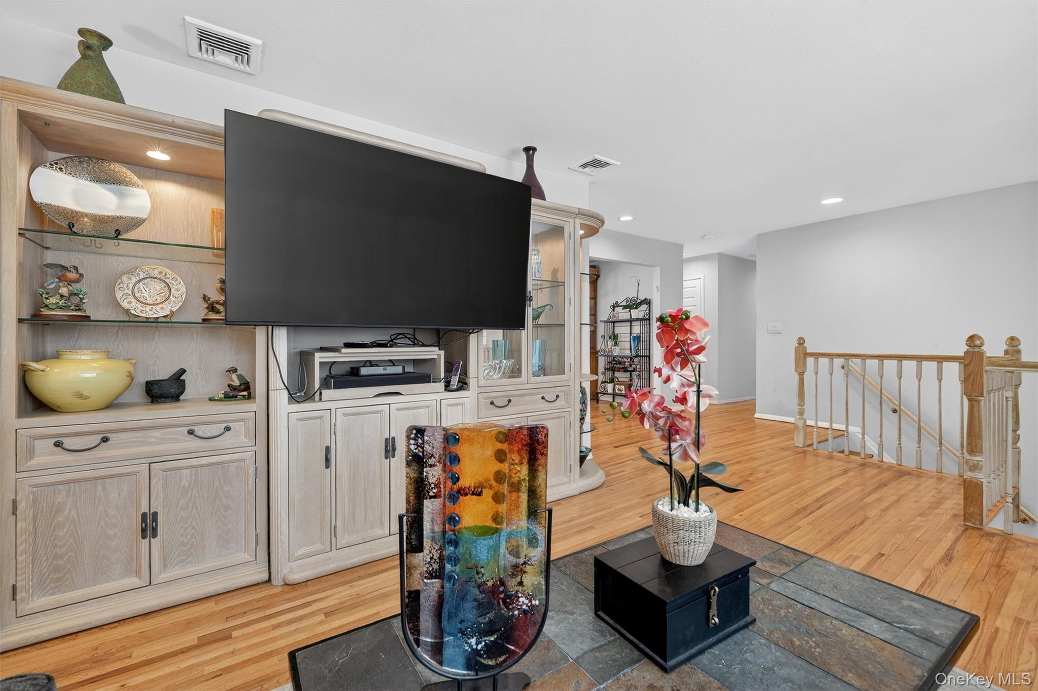 5 Raleigh Drive New City, NY 10956 - Photo 19 of 44 a living room with furniture and wooden floor
