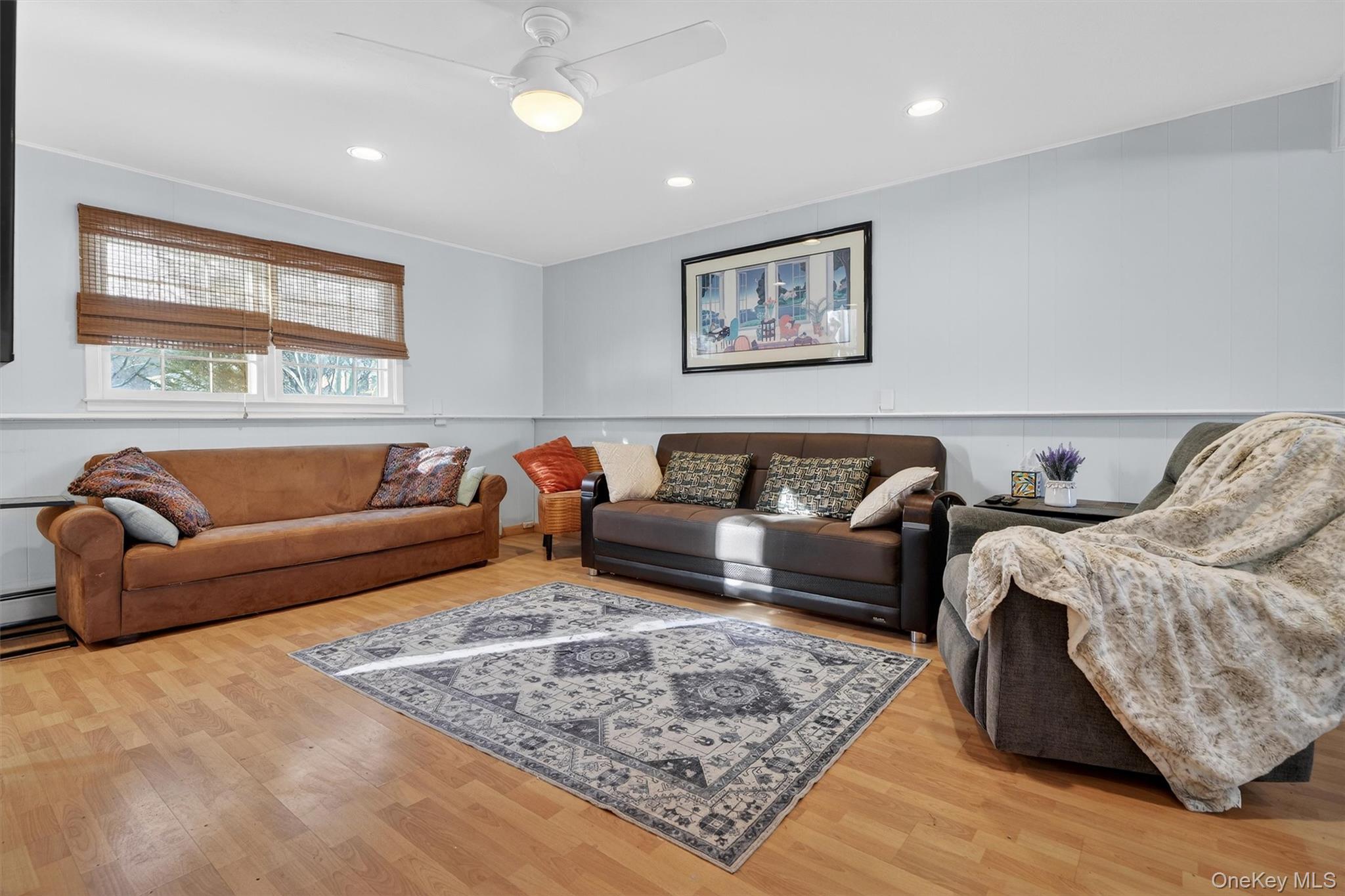 5 Raleigh Drive New City, NY 10956 - Photo 28 of 44 a living room with furniture and a couch