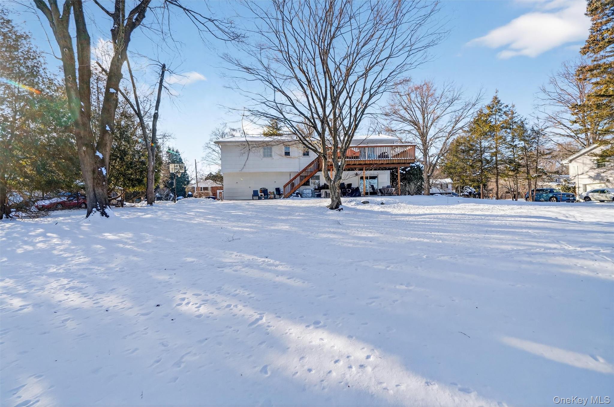 5 Raleigh Drive New City, NY 10956 - Photo 37 of 44 a view of a house with a yard and large trees