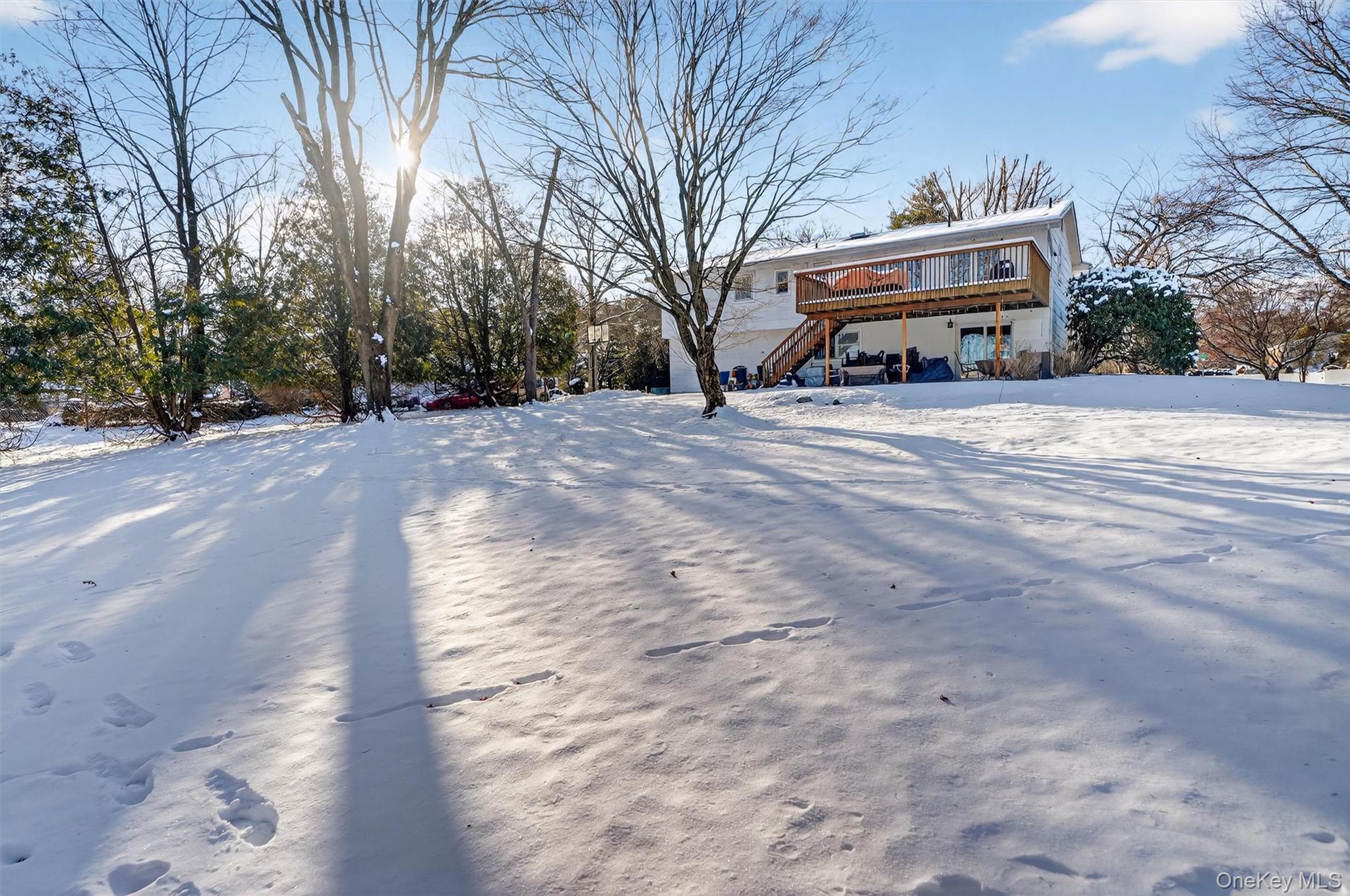 5 Raleigh Drive New City, NY 10956 - Photo 40 of 44 a house with trees in front of it