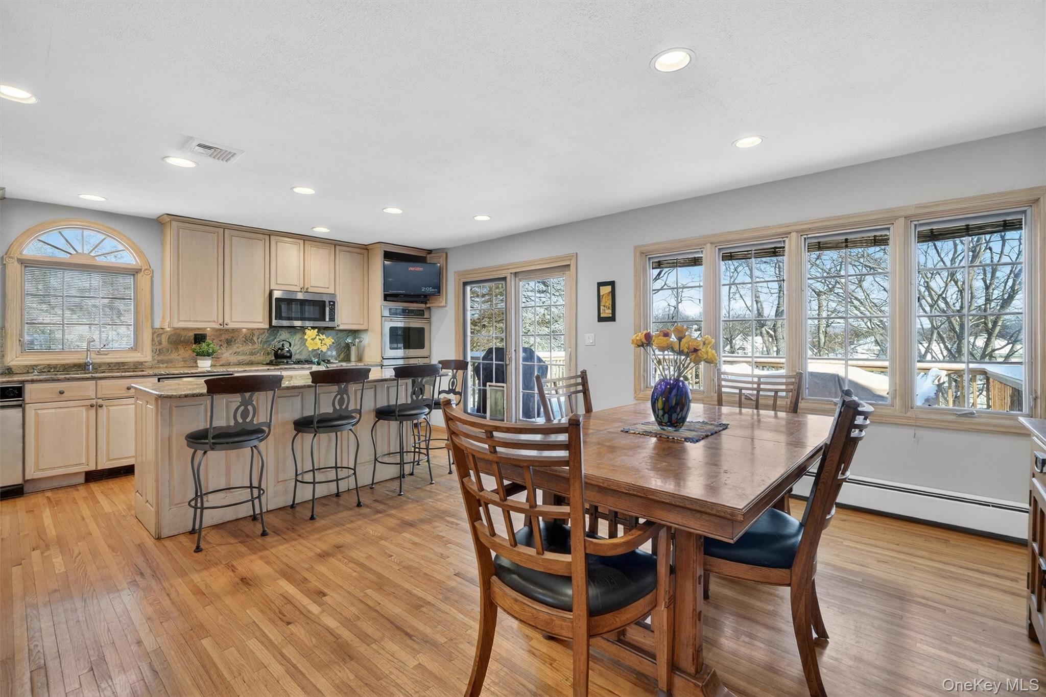 5 Raleigh Drive New City, NY 10956 - Photo 5 of 44 a view of a dining room with furniture window and wooden floor