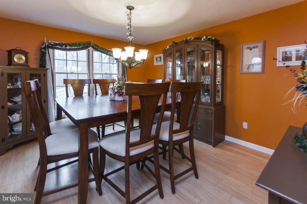 5097 Spring Road York, PA 17406 - Photo 8 of 30 Spacious dining room with wood floors