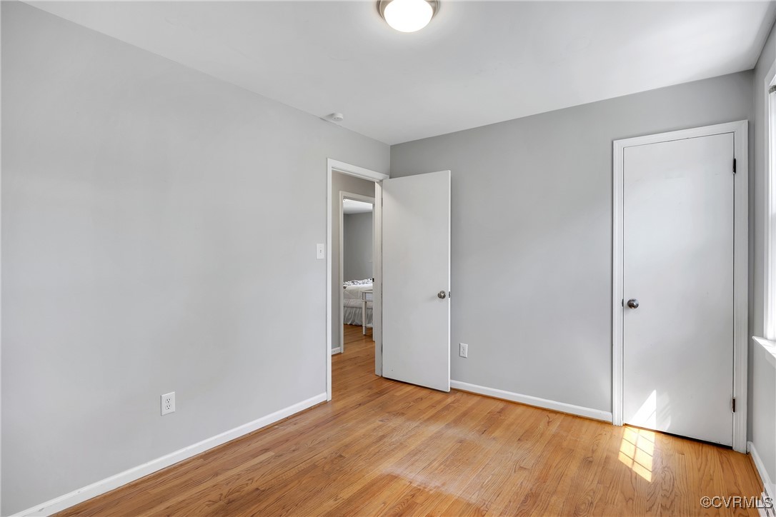 8202 Colebrook Road Richmond, VA 23227 - Photo 21 of 25 Unfurnished bedroom featuring baseboards and light