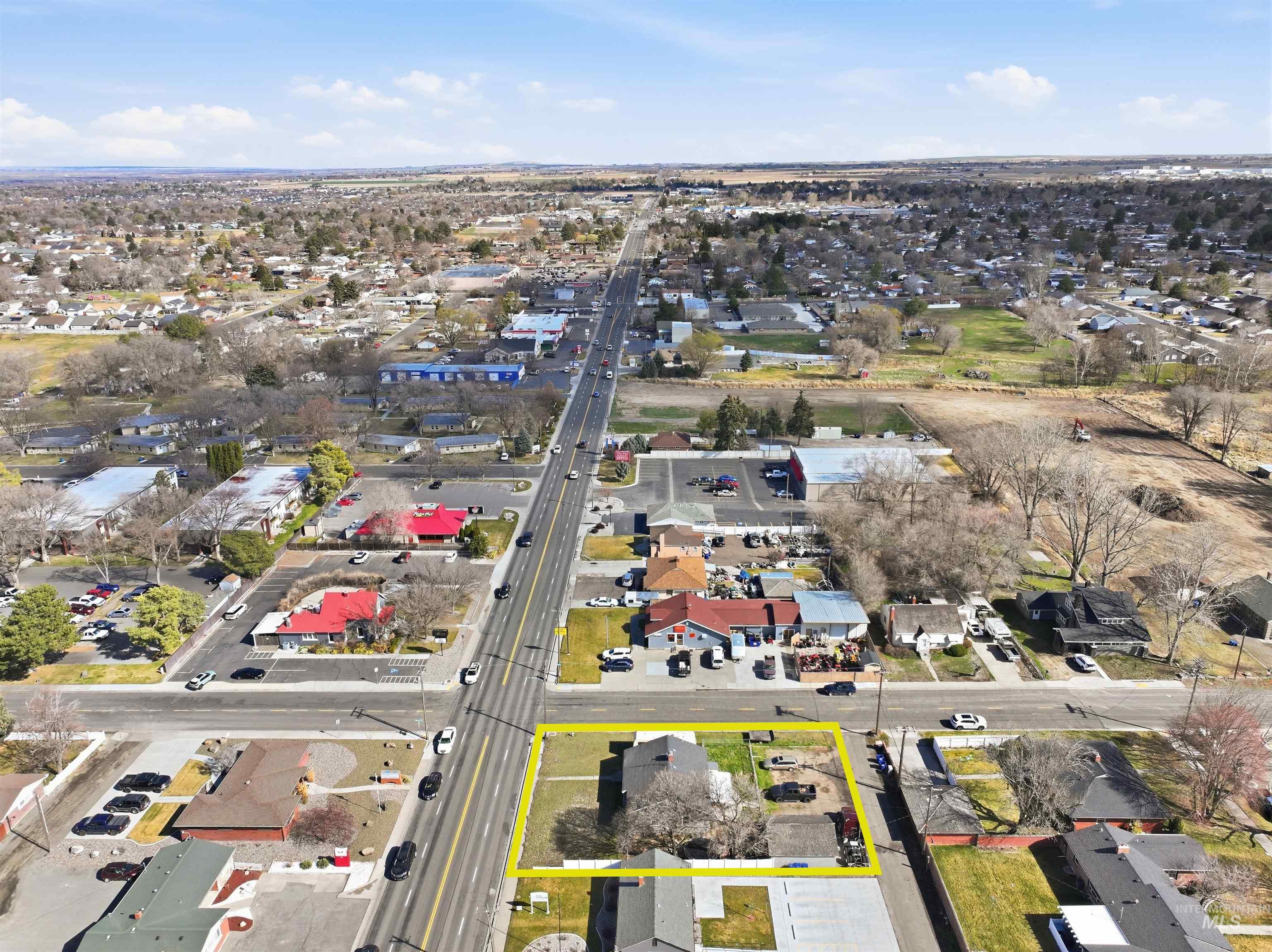 1644 Addison Avenue East Twin Falls, ID 83301 - Photo 11 of 18 Aerial view of property's location featuring property parcel outlined and nearby suburban area