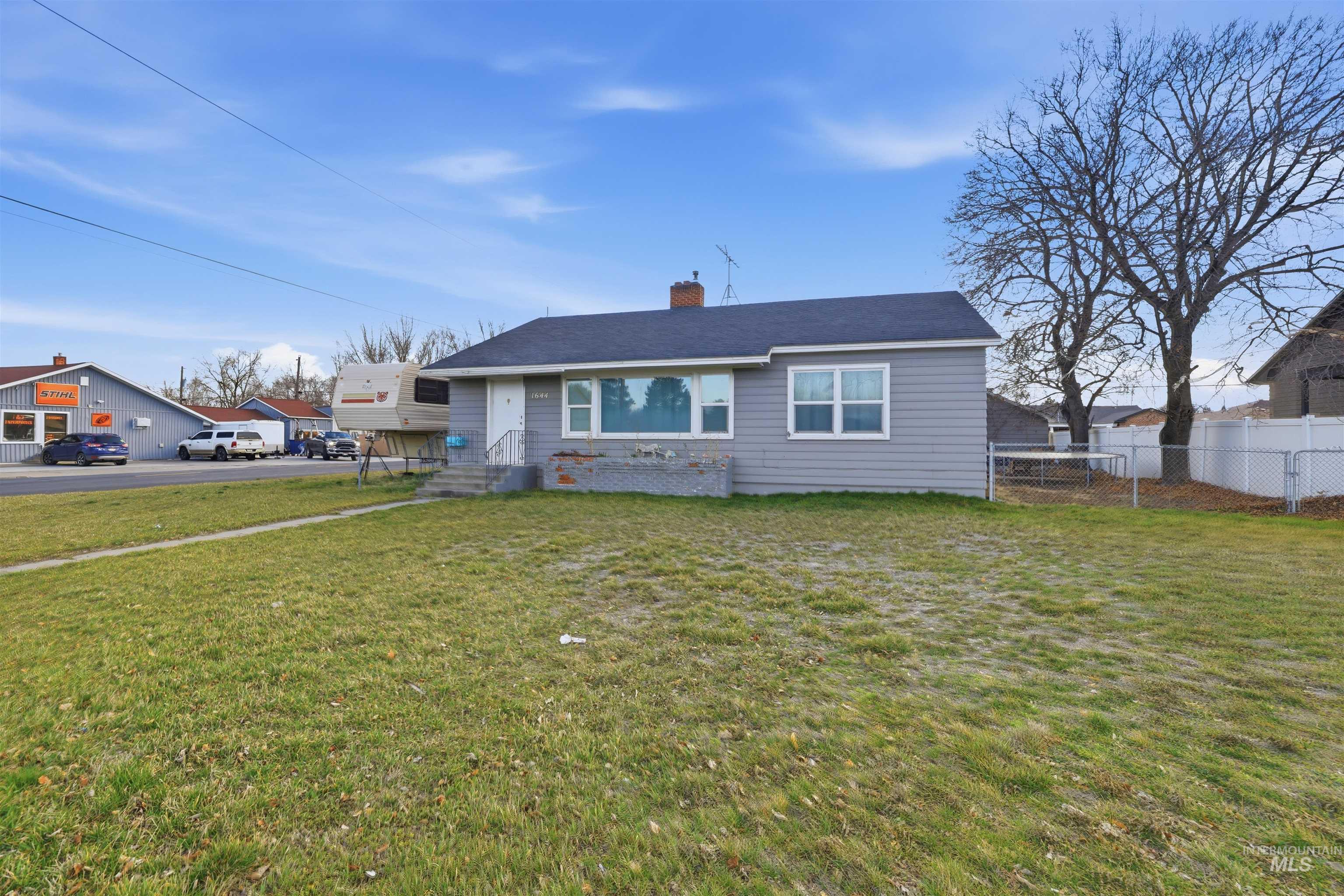 1644 Addison Avenue East Twin Falls, ID 83301 - Photo 2 of 18 View of front of house with a chimney