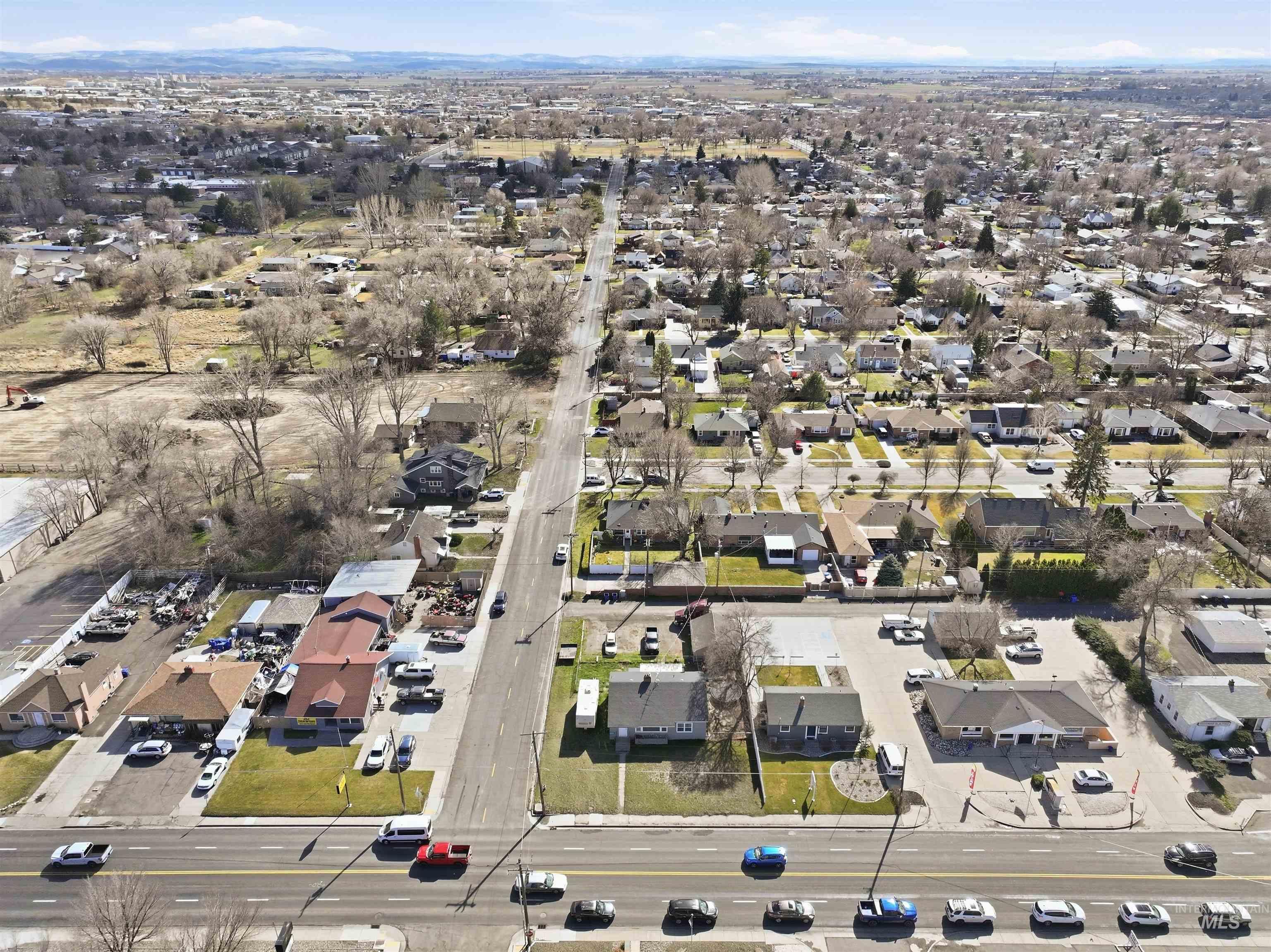1644 Addison Avenue East Twin Falls, ID 83301 - Photo 8 of 18 Aerial view of property and surrounding area featuring nearby suburban area