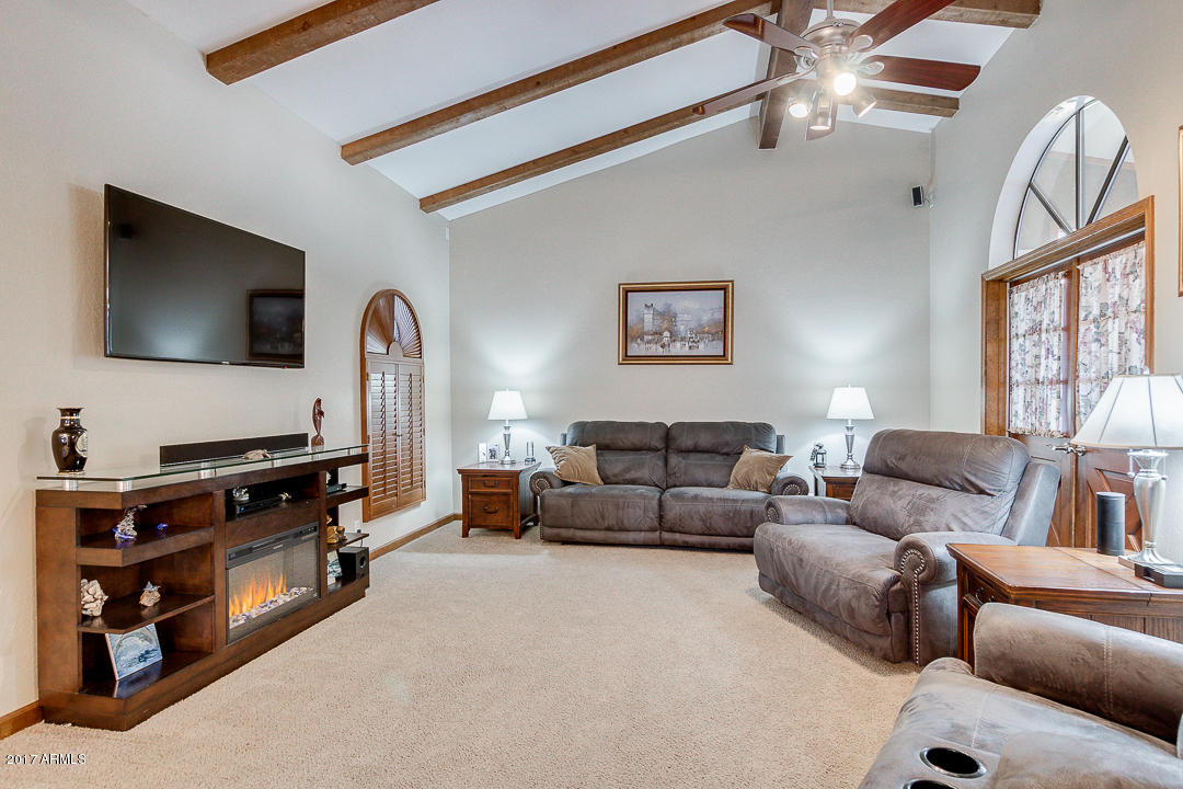 2890 East Ryan Road Gilbert, AZ 85297 - Photo 3 of 27 Living room with beam ceilings