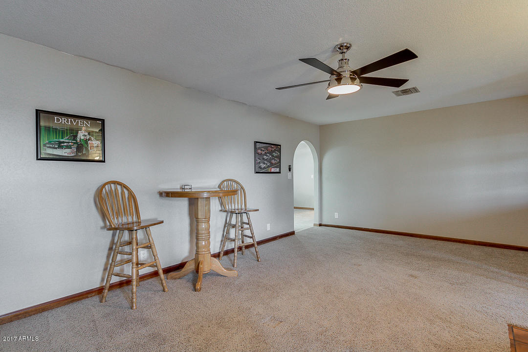 2890 East Ryan Road Gilbert, AZ 85297 - Photo 9 of 27 family room