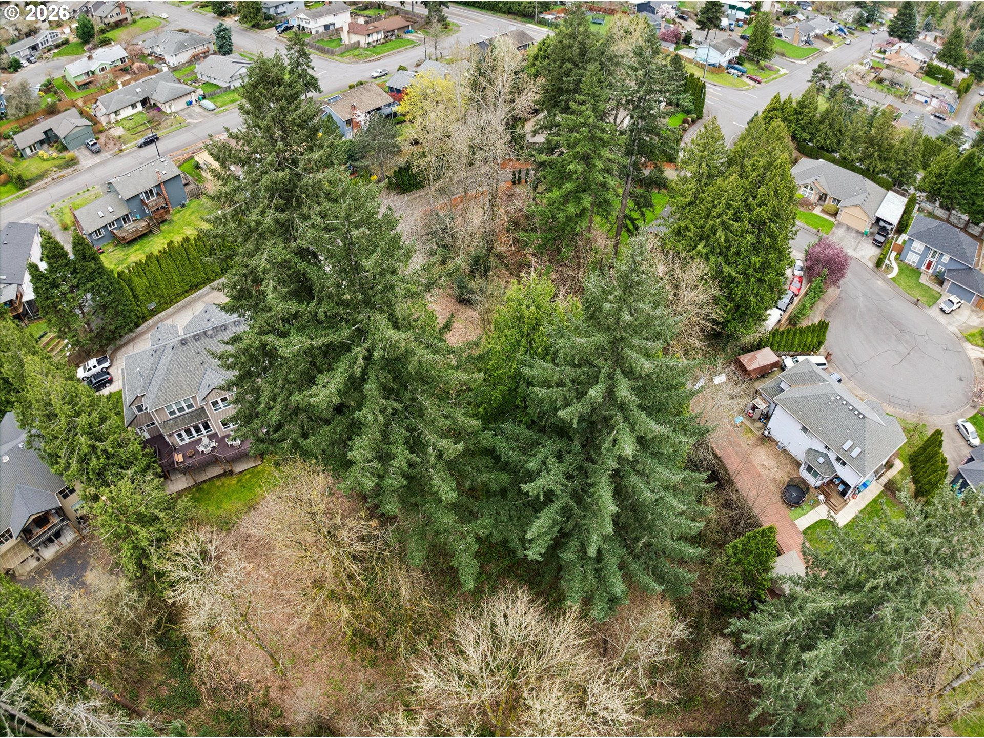 1488 Southwest 17th Court, Unit N Gresham, OR 97080 - Photo 8 of 11 an aerial view of residential house with outdoor space and trees all around