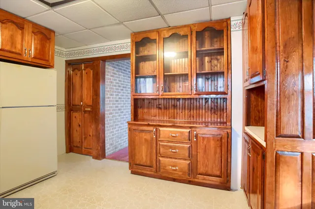 a kitchen with stainless steel appliances granite countertop a stove and a cabinets