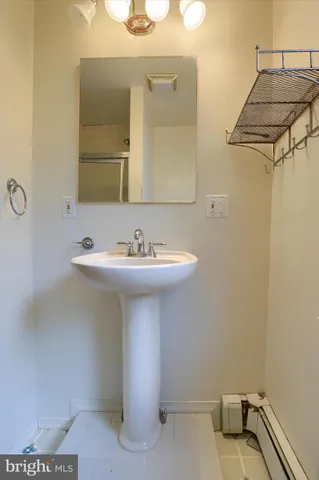 a view of an empty room and a window