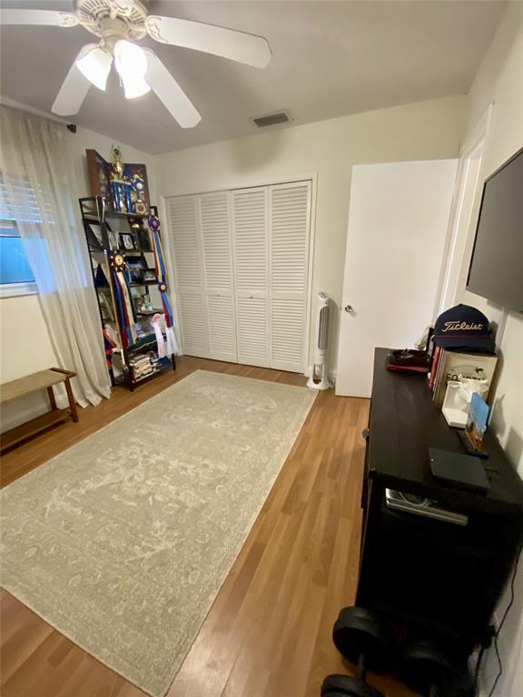 2755 Northeast 28th Avenue, Unit E3 Lighthouse Point, FL 33064 - Photo 13 of 48 a room with gym equipment