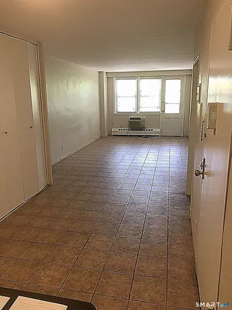 a view of hallway with a window