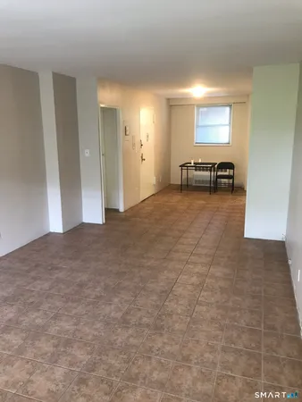 a view of a livingroom with a furniture
