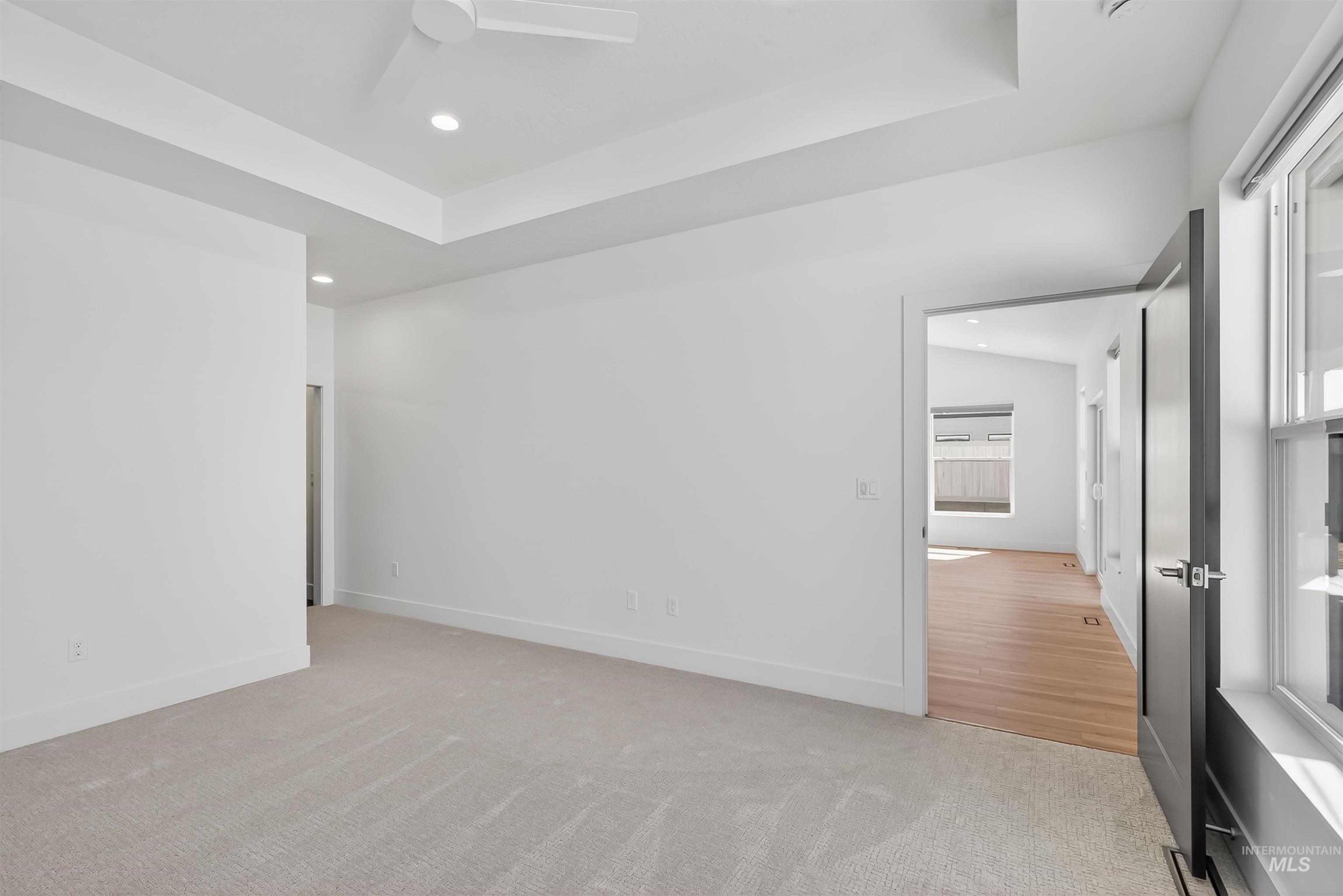 3710 22nd Street Lewiston, ID 83501 - Photo 25 of 36 Spare room with a raised ceiling, light colored carpet, recessed lighting, and ceiling fan