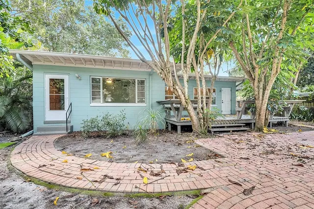 a view of an empty room with a cabinet