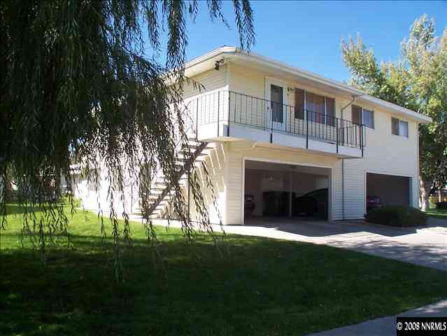 5001 Tahiti Way, Unit 3 Reno, NV 89502 - Photo 8 of 9 a front view of a house with a garden