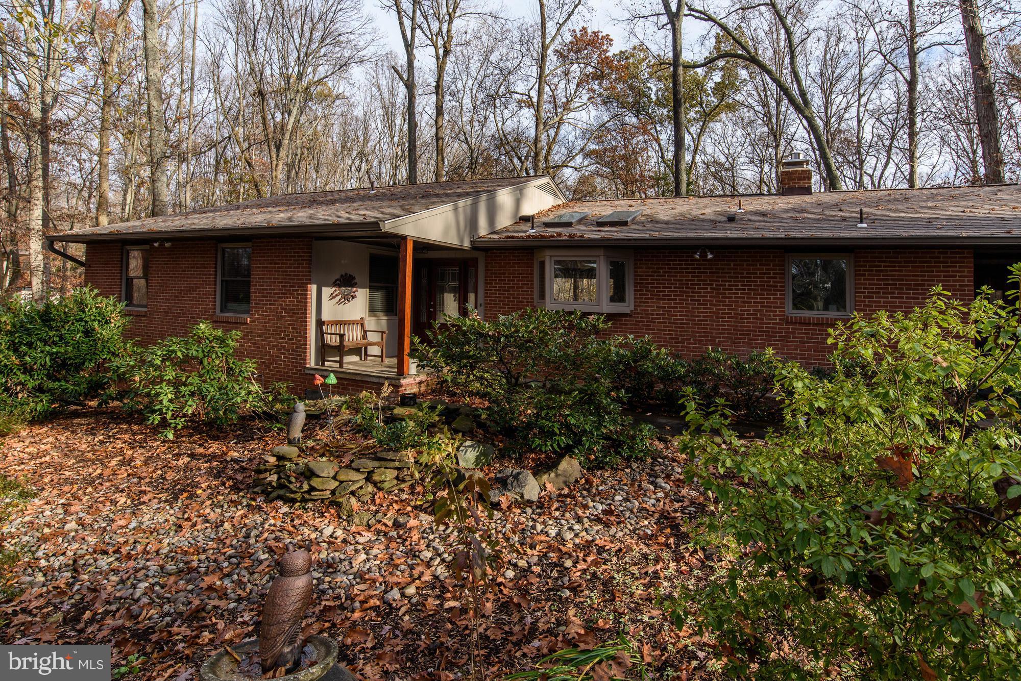 10302 Lloyd Road Potomac, MD 20854 - Photo 2 of 30 a view of outdoor space and garden