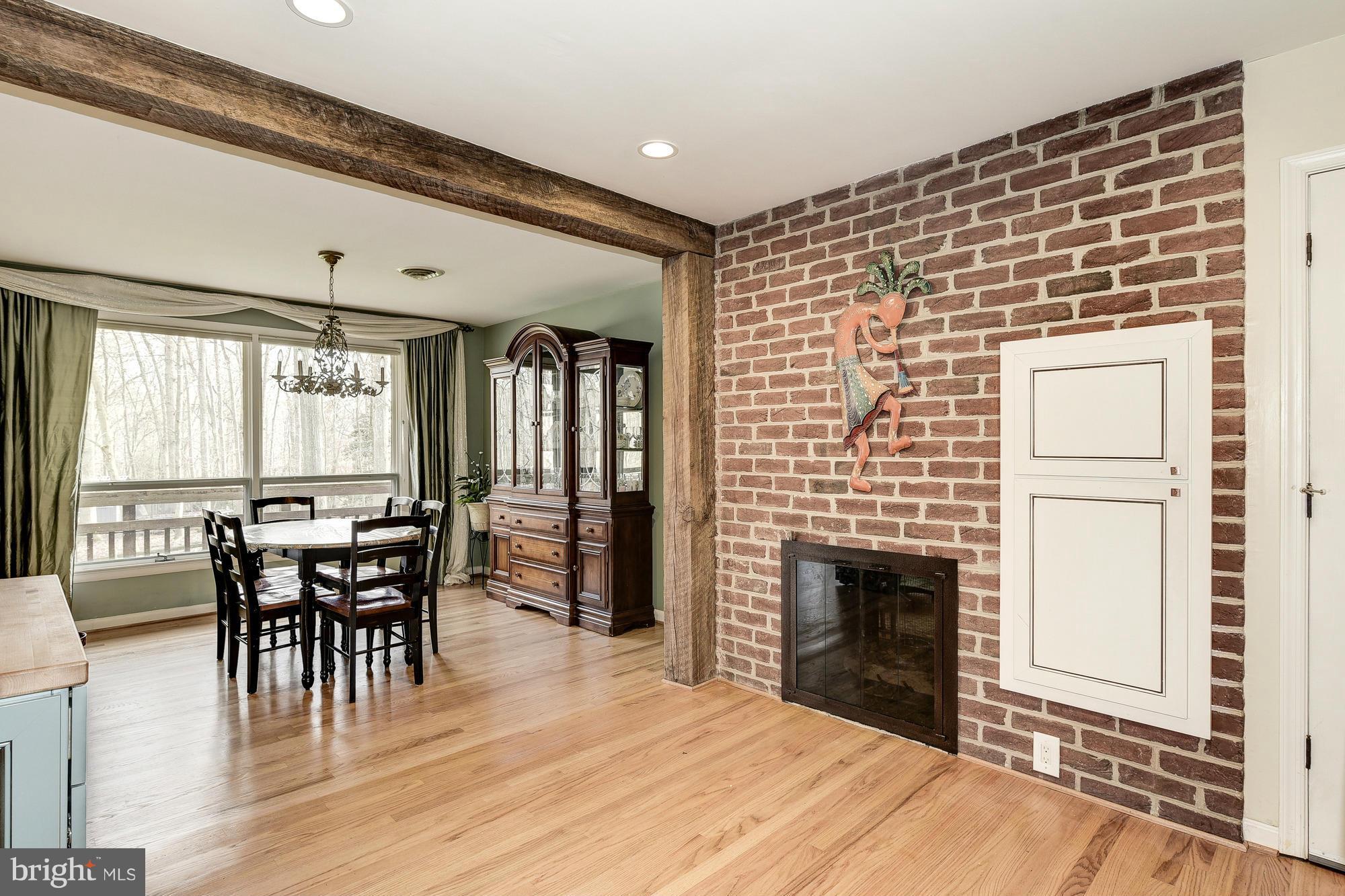10302 Lloyd Road Potomac, MD 20854 - Photo 12 of 30 a dining room with furniture and window