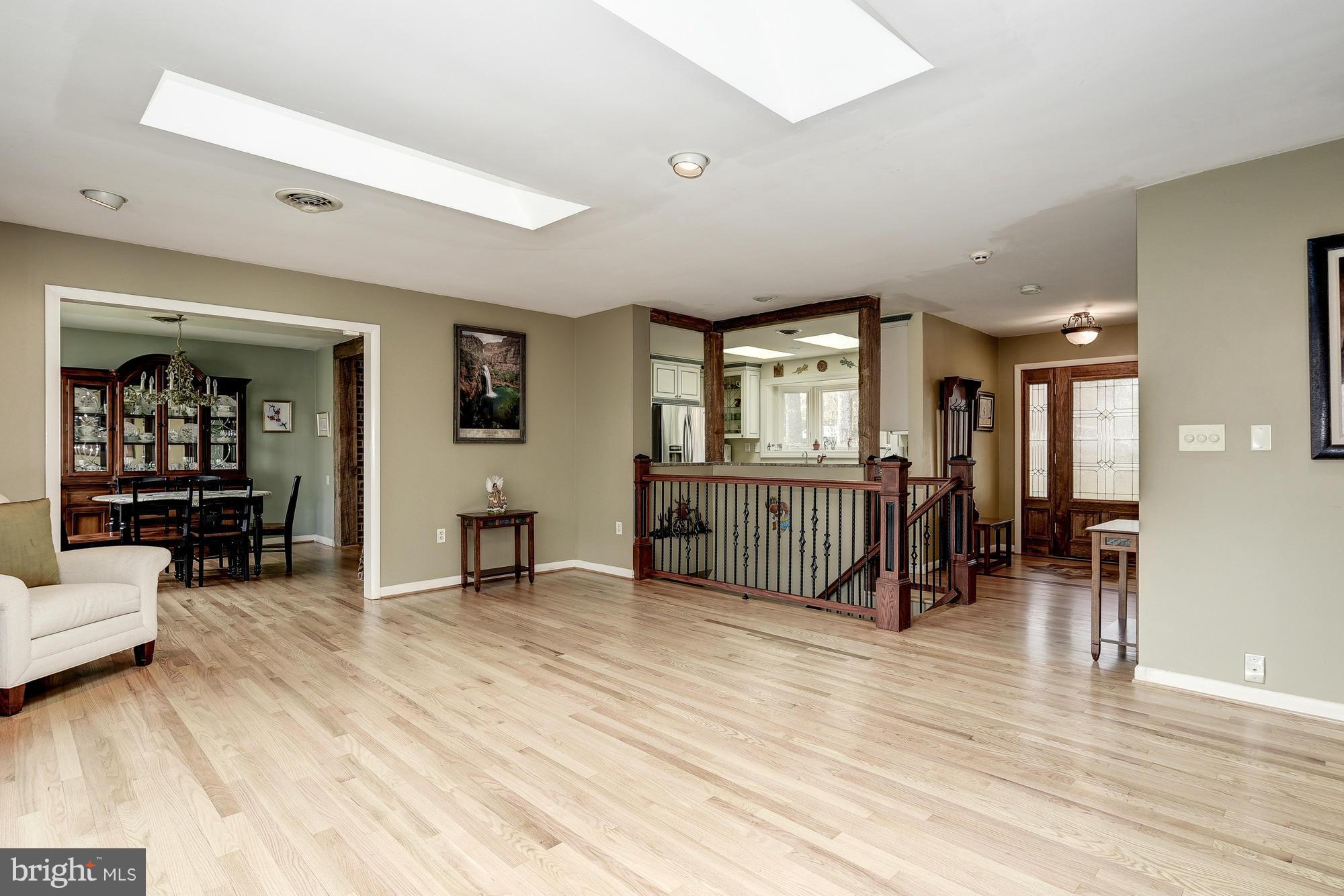 10302 Lloyd Road Potomac, MD 20854 - Photo 7 of 30 a view of a livingroom with furniture and a livingroom