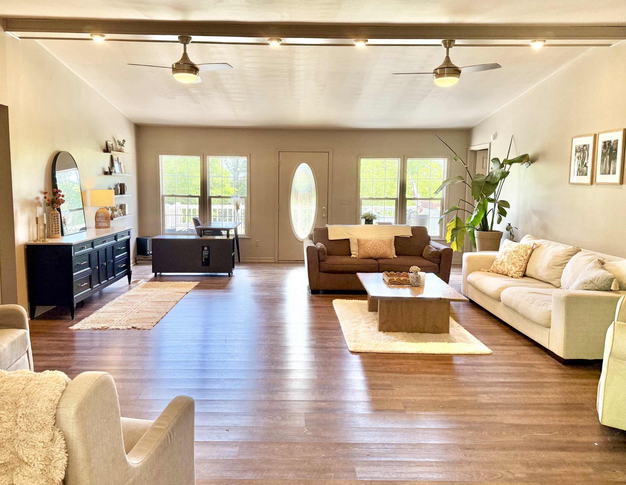 4002 Rippey Lake Road Mount Pleasant, TN 38474 - Photo 25 of 43 a living room with furniture or couch and a large window