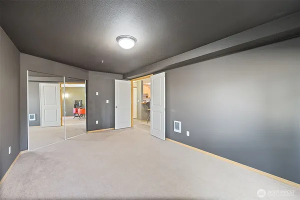wooden floor and window in an empty room