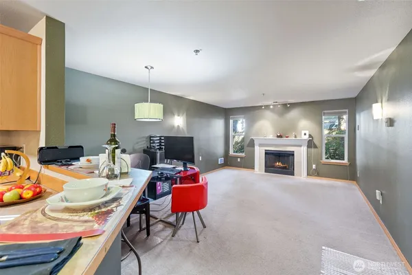 a view of a livingroom with furniture and a fireplace