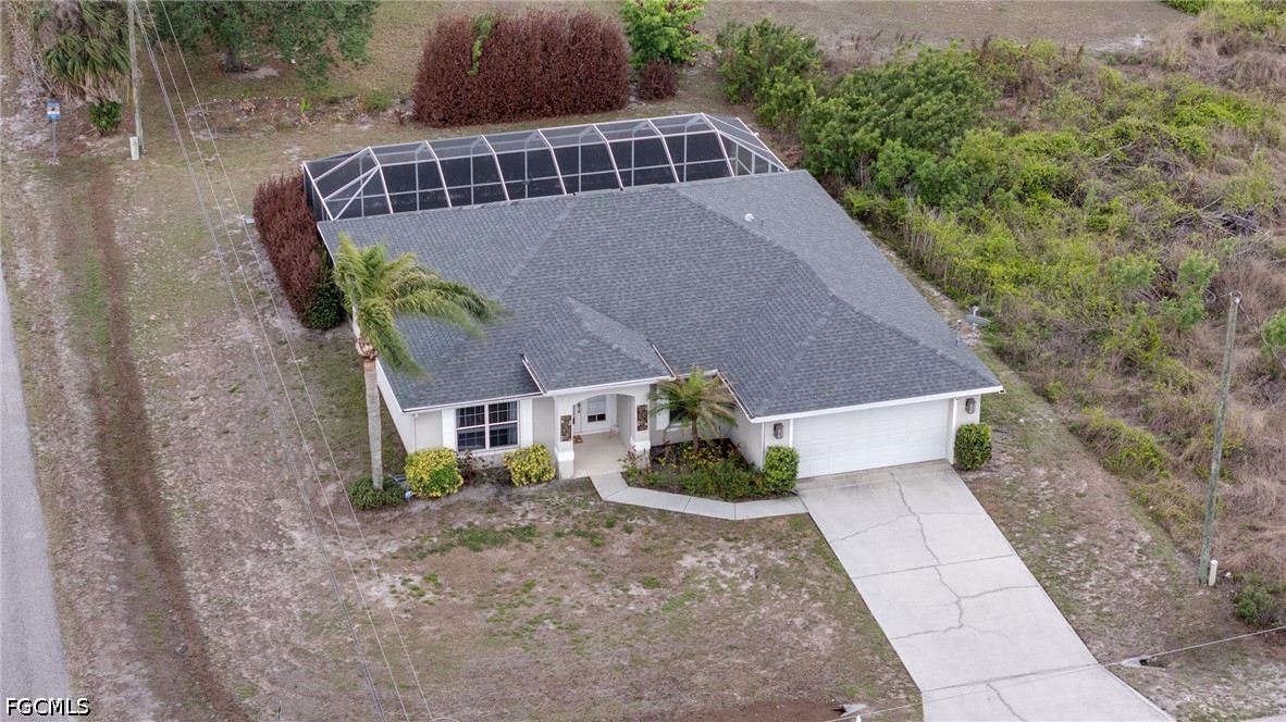 3801 28th Street Southwest Lehigh Acres, FL 33976 - Photo 32 of 37 a front view of a house with a yard