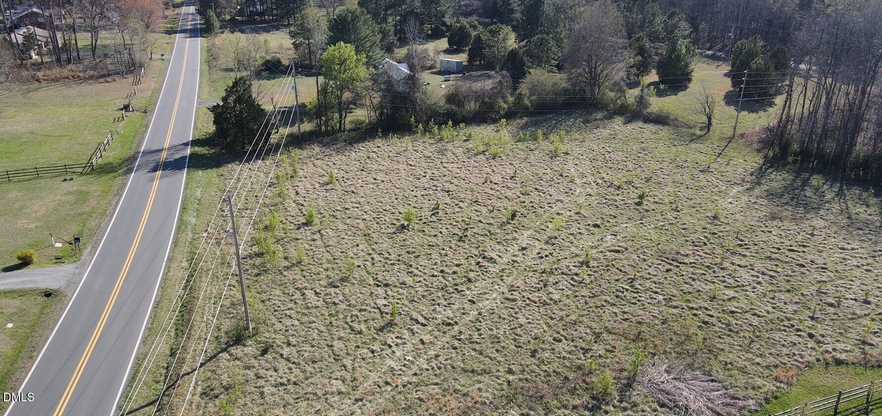 a view of balcony with wooden floor
