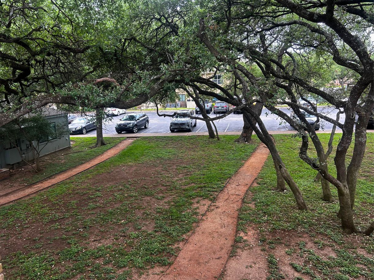 8210 Bent Tree Road, Unit 247 Austin, TX 78759 - Photo 15 of 21 a childrens park with lots of trees and plants
