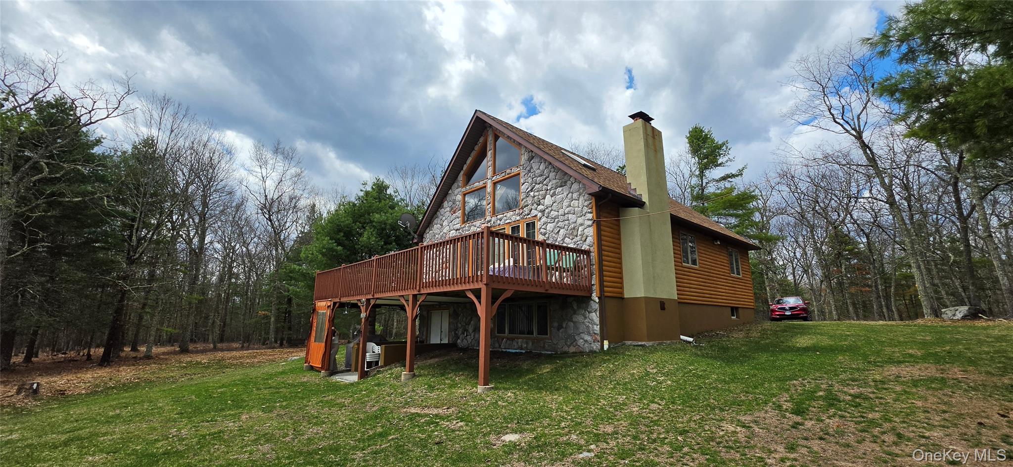 125 Woods Road Barryville, NY 12719 - Photo 1 of 34 front view of house with a yard