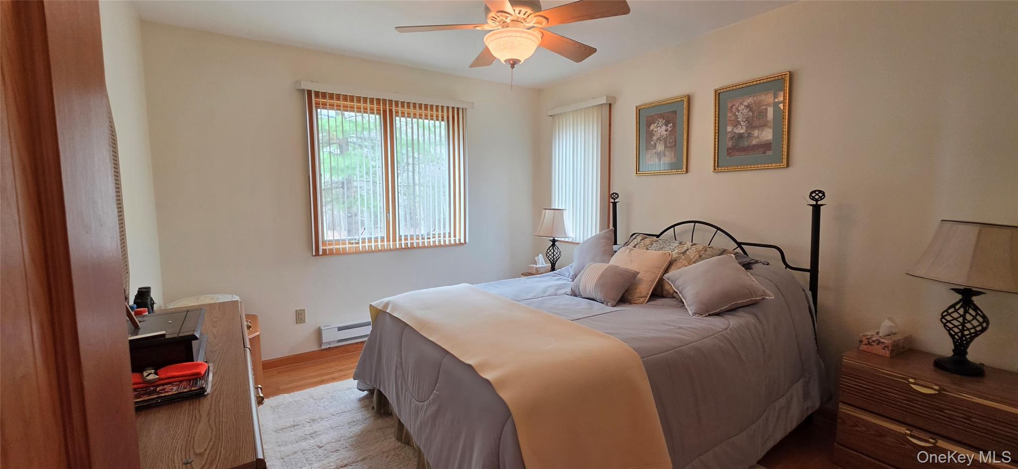 125 Woods Road Barryville, NY 12719 - Photo 21 of 34 a bedroom with a bed and a window