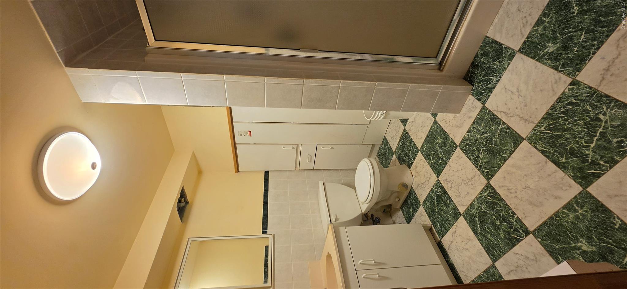125 Woods Road Barryville, NY 12719 - Photo 30 of 34 a bathroom with a sink and a mirror