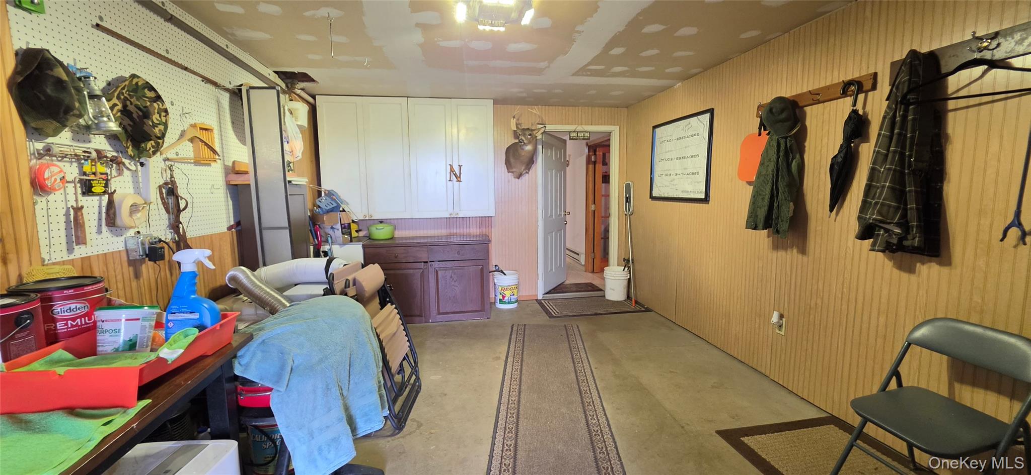 125 Woods Road Barryville, NY 12719 - Photo 32 of 34 a bed room with a bed and a chair