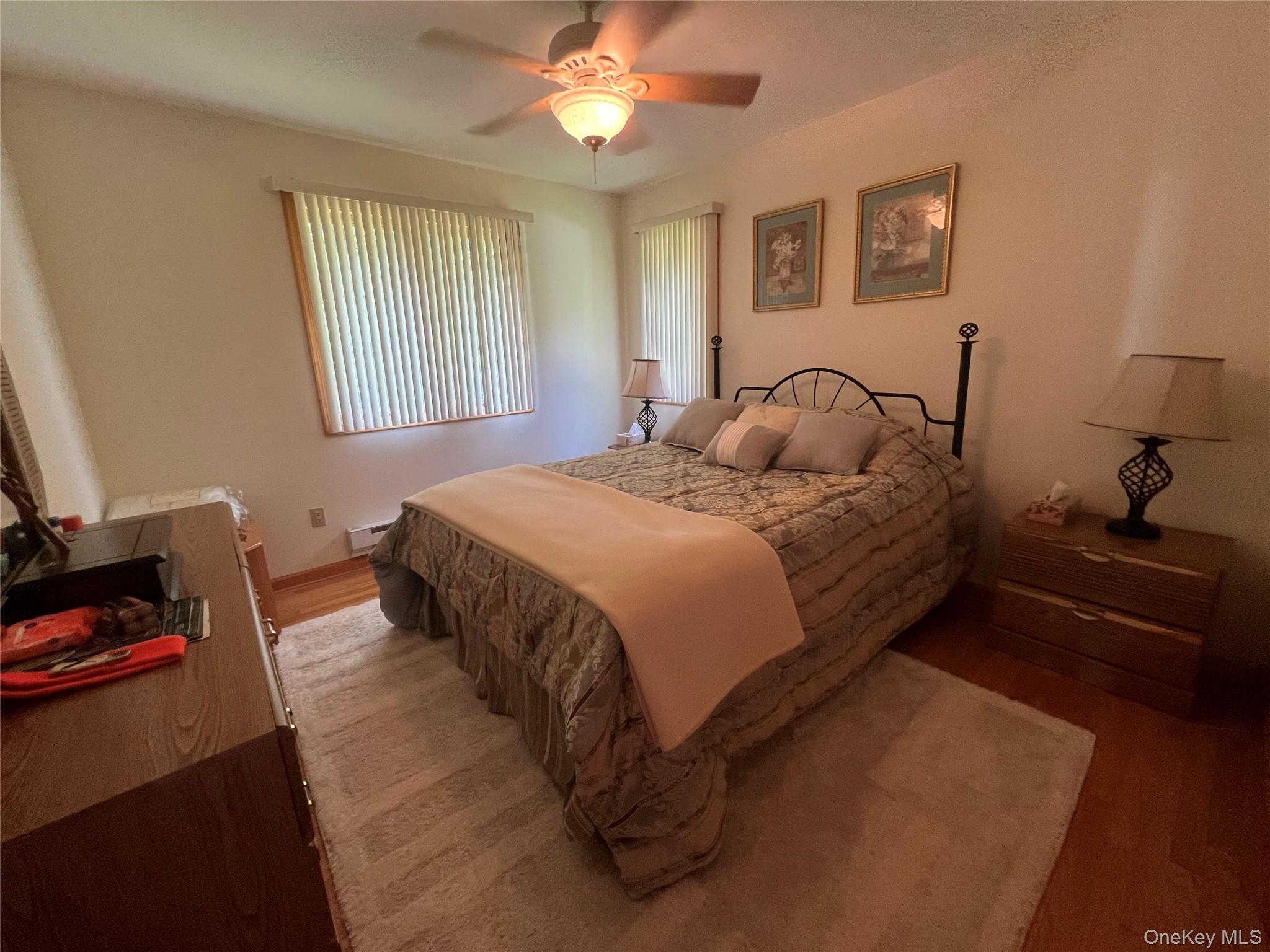 125 Woods Road Barryville, NY 12719 - Photo 8 of 25 a bedroom with a bed and a window