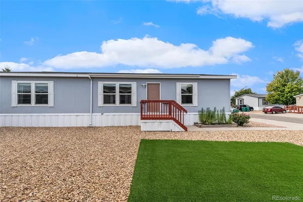 a house view with a garden space