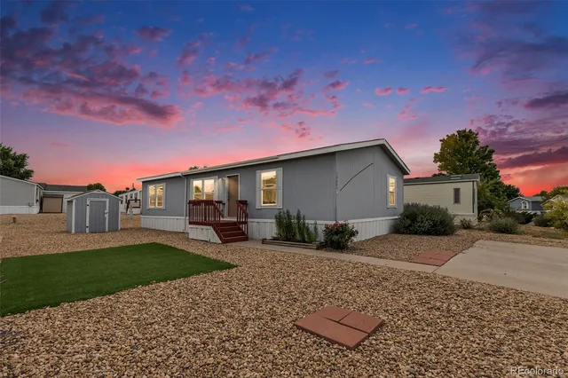a house with garden in front of it