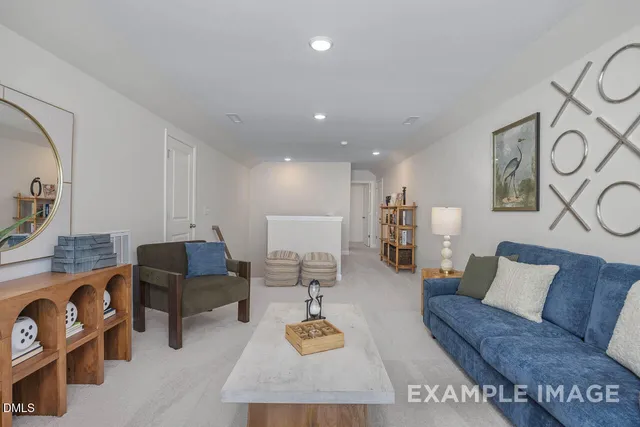 a living room with furniture and a couch