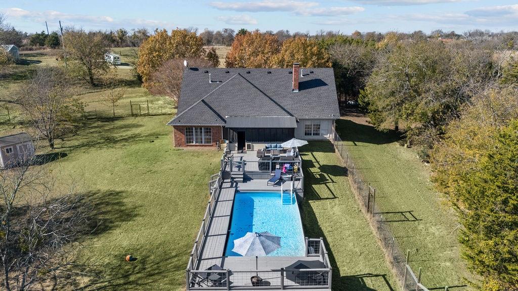 831 Union Hill Road Ennis, TX 75119 - Photo 4 of 38 a aerial view of a house with a big yard