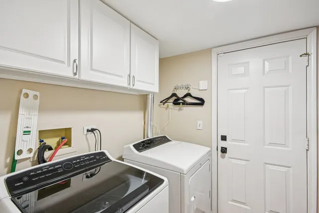a kitchen with a stove and a cabinet