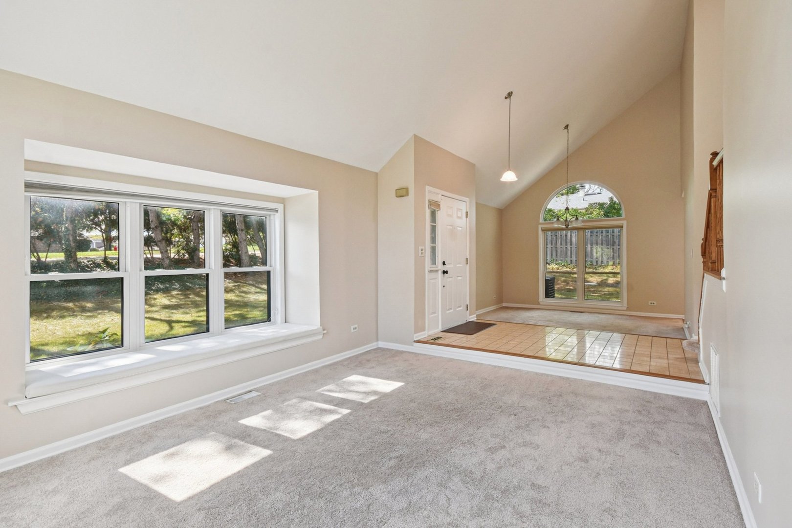 22 Ascot Circle Schaumburg, IL 60194 - Photo 3 of 25 a view of an empty room with a window