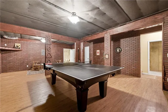 a view of a backyard with sitting area