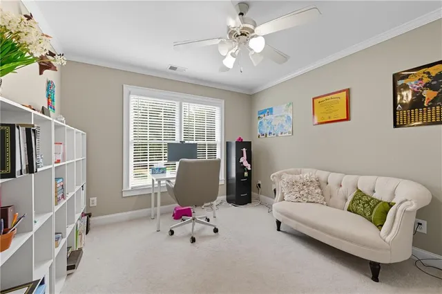 a bathroom with a mirror and a sink