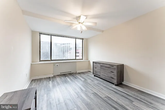 a bathroom with a sink a mirror toilet and bathtub