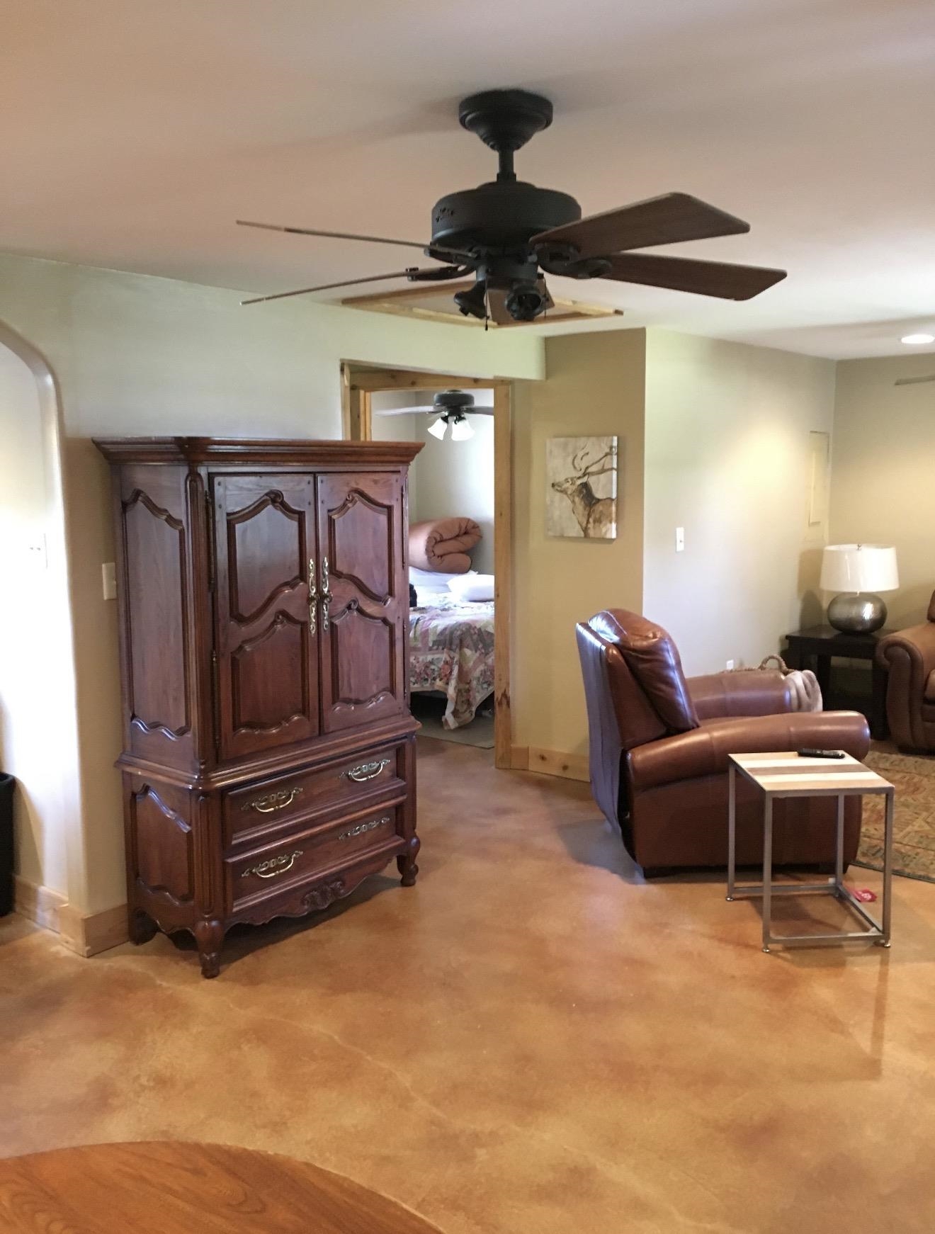 105 Bateman Road Moscow, TN 38057 - Photo 8 of 26 a living room with furniture a ceiling fan and a window