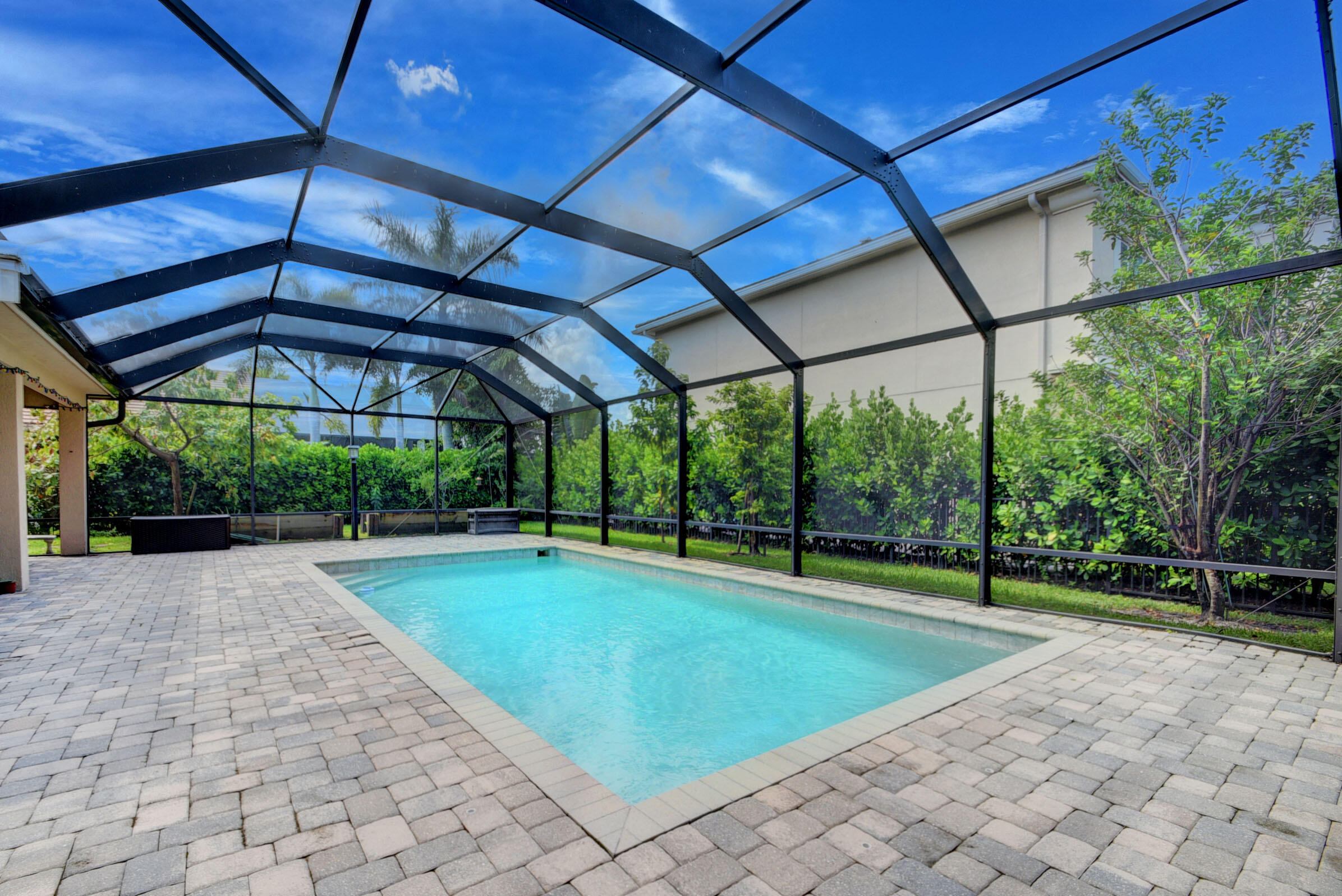 8625 Wellington View Drive Royal Palm Beach, FL 33411 - Photo 39 of 54 a view of yard with swimming pool