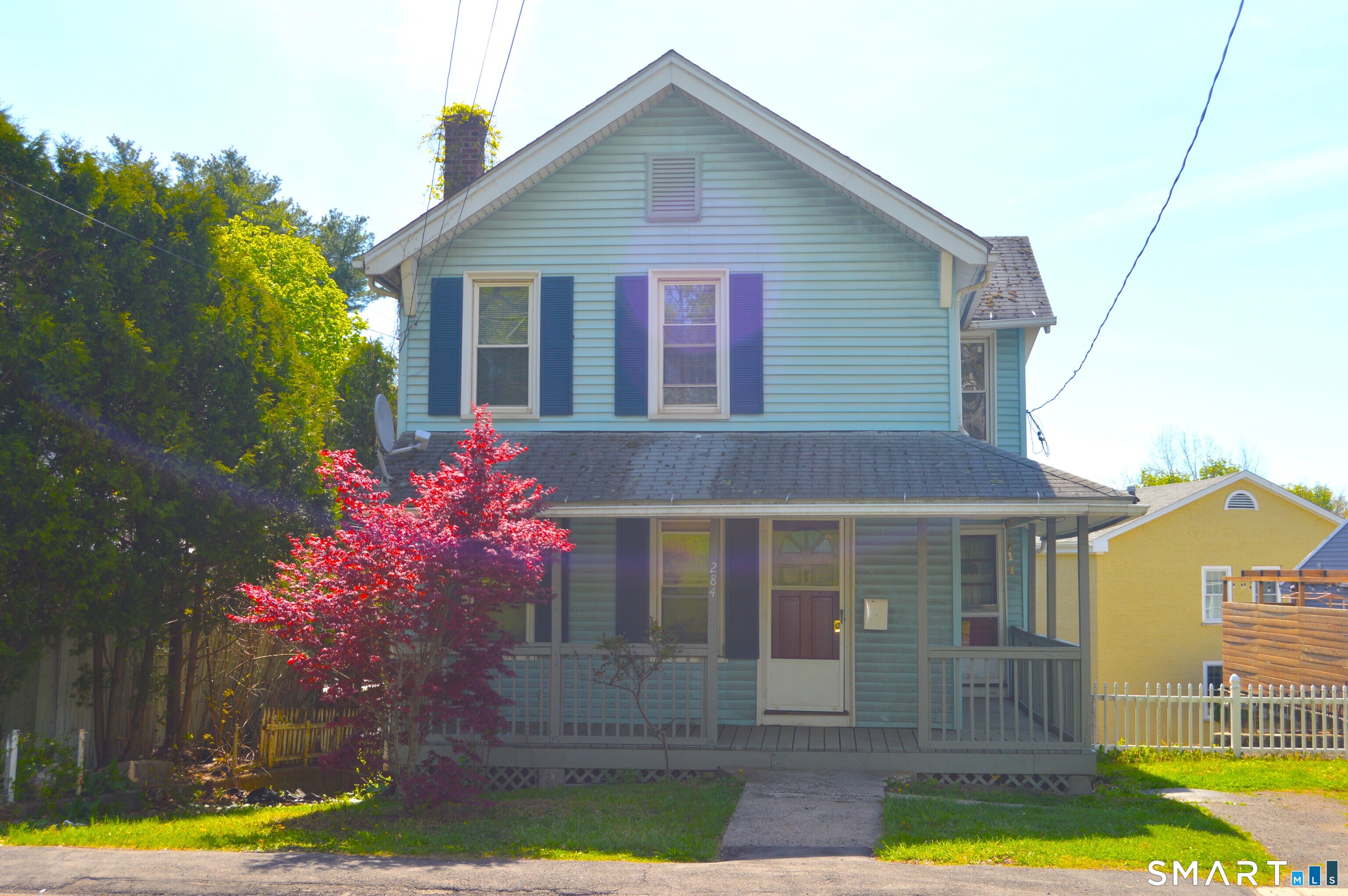 a front view of house with yard