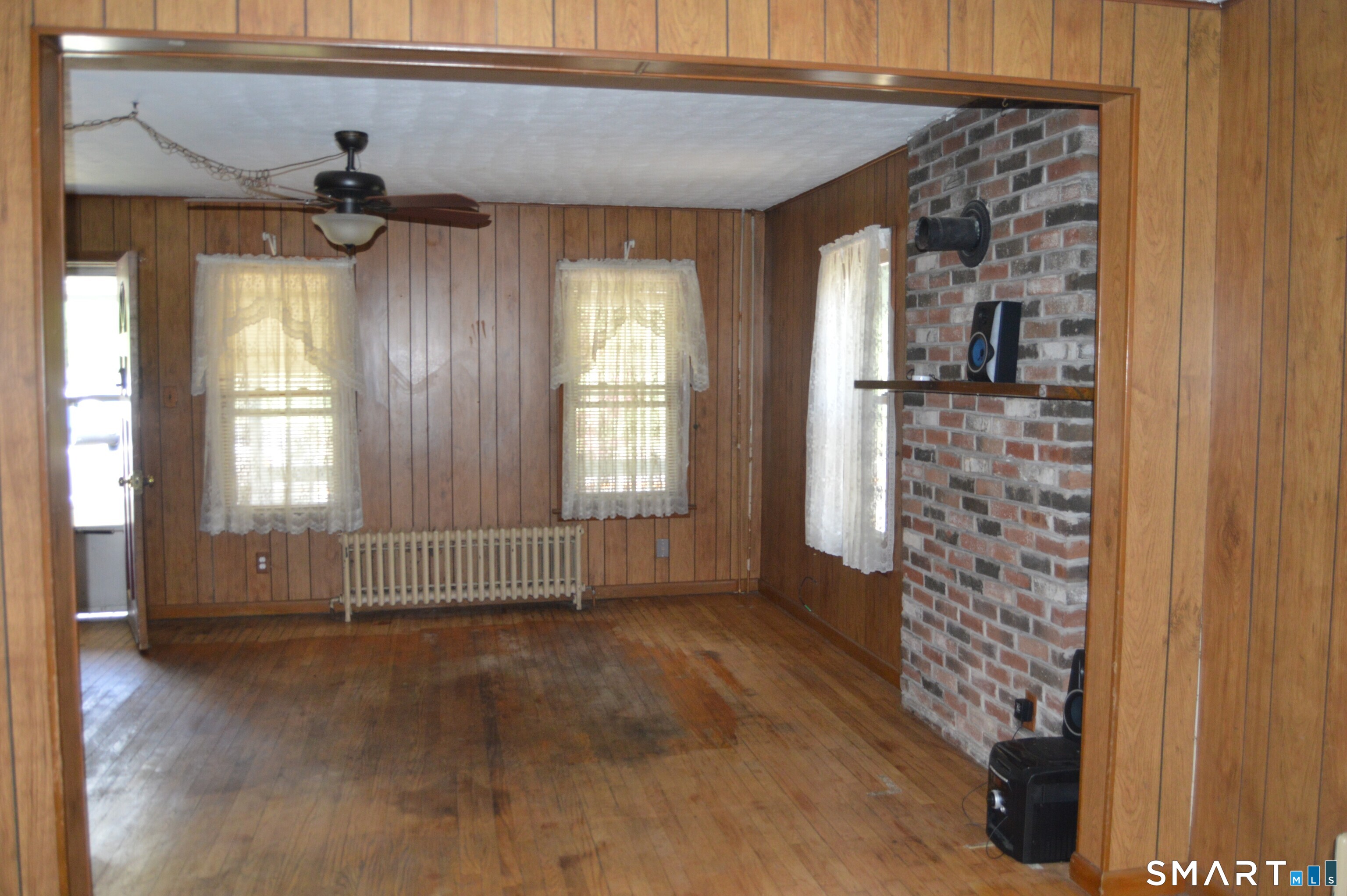 284 Main Street Berlin, CT 06023 - Photo 13 of 28 a view of entryway with window and wooden floor