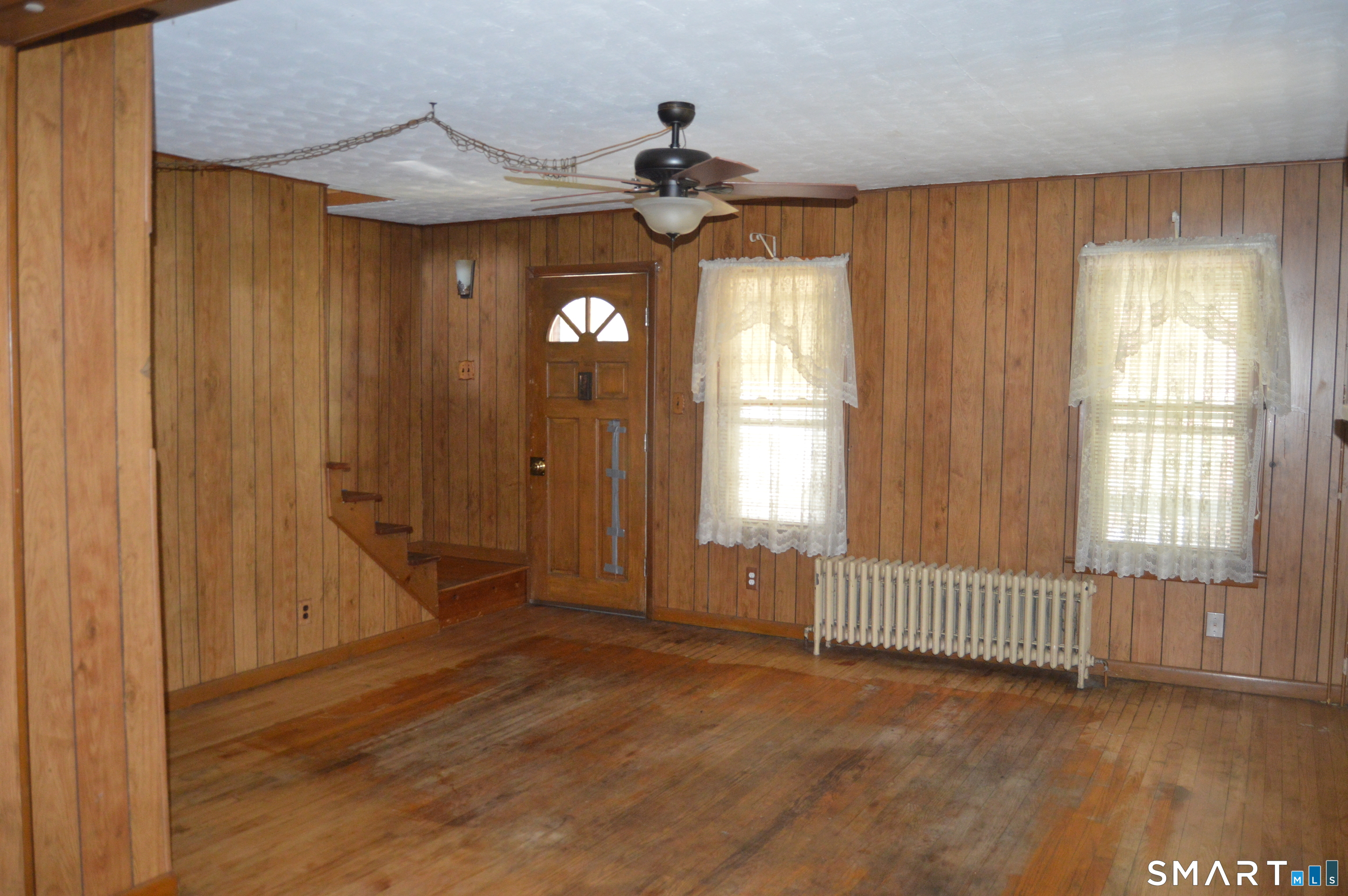 284 Main Street Berlin, CT 06023 - Photo 15 of 28 a view of a room with a window and wooden floor
